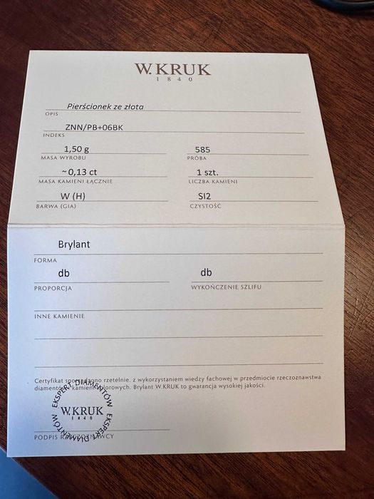 złoty pierścionek z brylantem Kruk