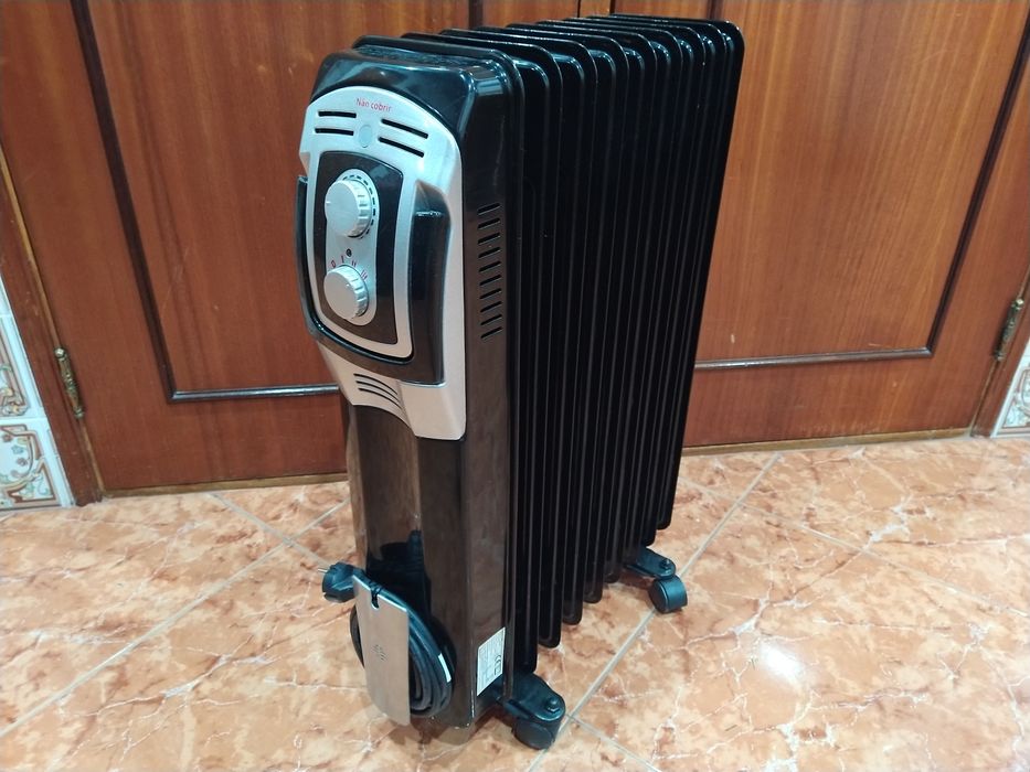 Aquecedor radiador a óleo casa quarto apartamento vivenda escritório gabinete cozinha.