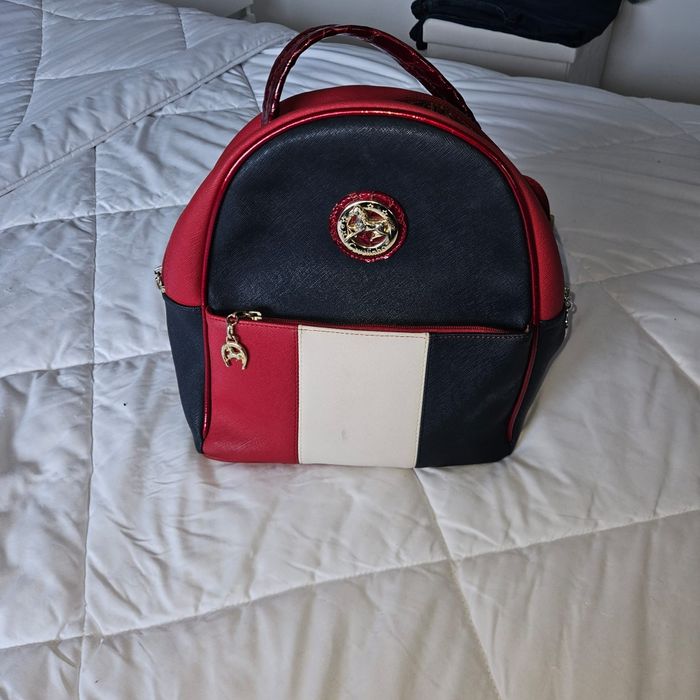 Vendo mochila + porta moedas cavalinho