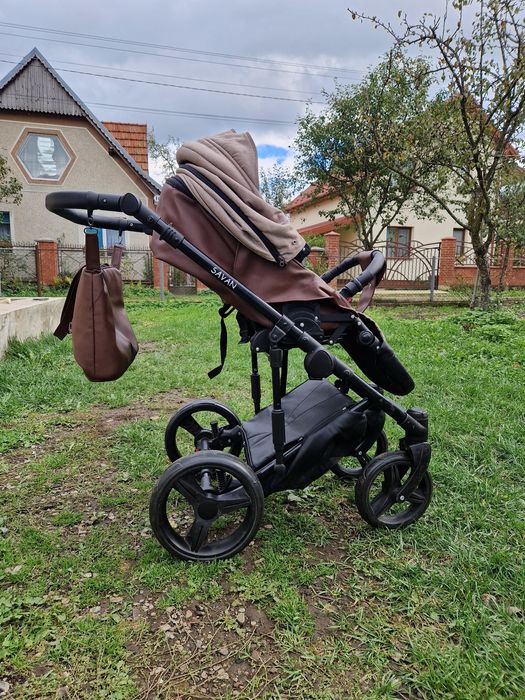 Дитяча каляска як для хлопчика так і для дівчинки