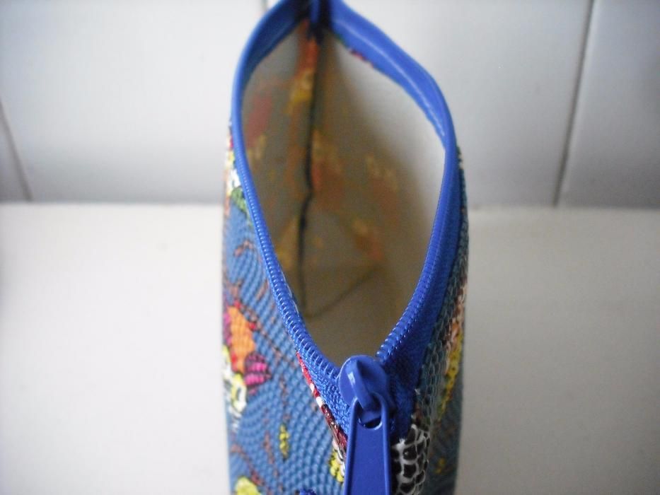 Bolsa tailandesa com mochos