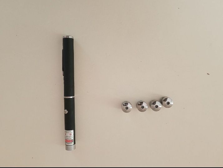 Мультирежимна лазерна указка з насадками