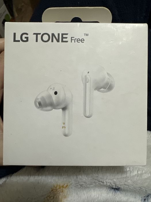 LG tone free brancos