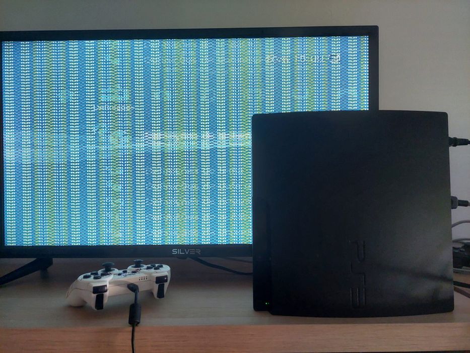 PS3 Slim com 2 Comandos e Lote Jogos ( Avariada).