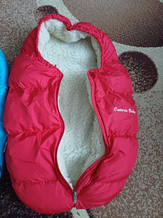 Конверт на Виписку!Продам два  зимових конверти в коляску на овчині.