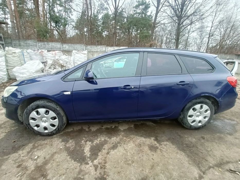 OPEL ASTRA IV J 09-12 2011 r. Z20Z BŁOTNIK LEWY PRZÓD PRZEDNI LP *