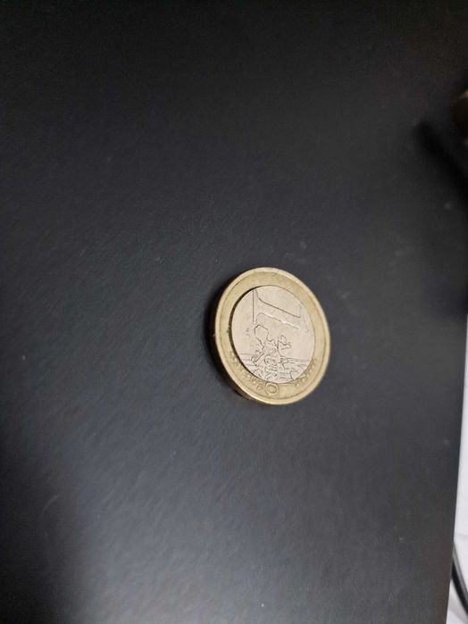 Moeda de 1 euro com defeito
