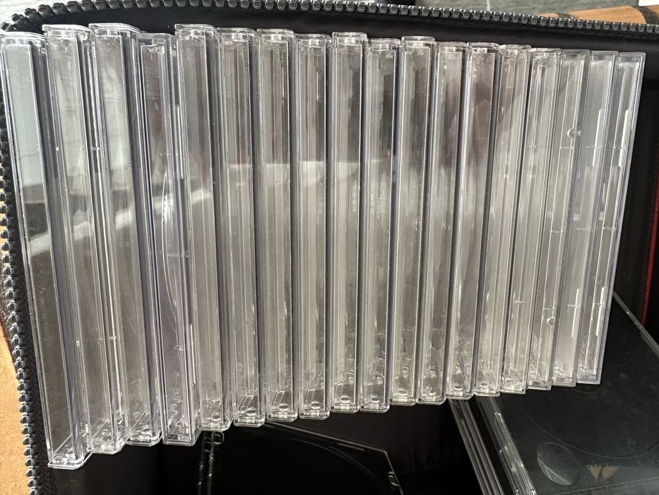 Conjunto de 28 caixas transparentes para CD DVD com caixa para guardar
