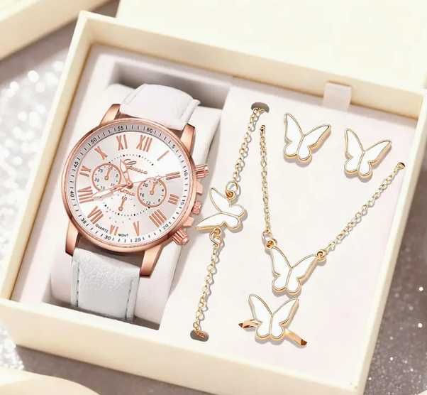 Zegarek damski na białym pasku z dodatkami