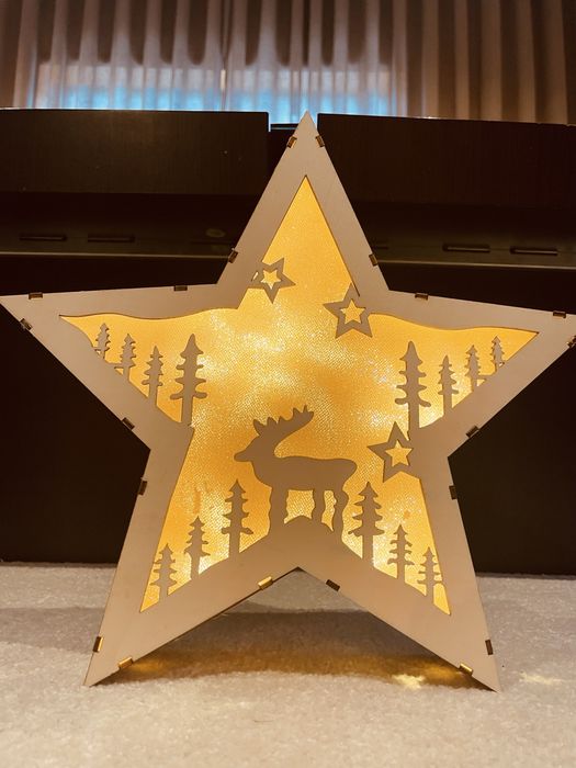 Estrela de Natal em madeira com luz