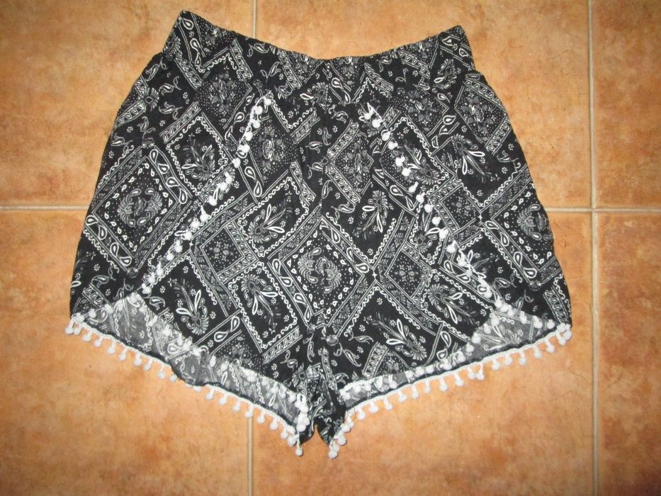 Calças e calções 10/12 anos