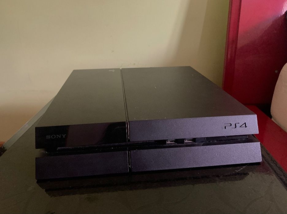 PlayStation 4 Fat 1TB — комплект із джойстиком та іграми