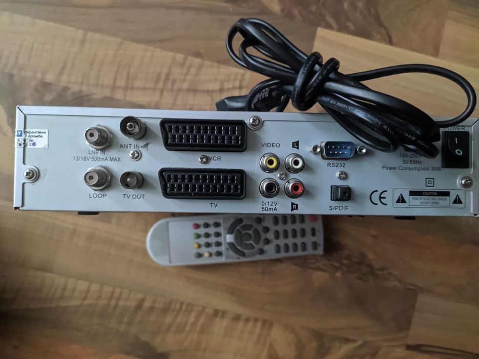 Супутниковий тюнер opticum 7100A