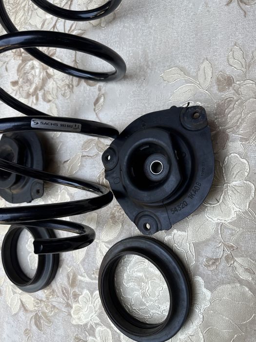 Продам новую пружину NISSAN LEAF 2011-2016год, опорные подшипники бу.