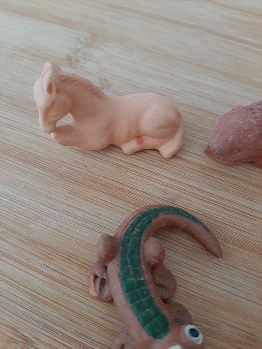 Animais em miniatura barro