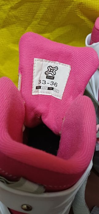 Patins em linha cor rosa