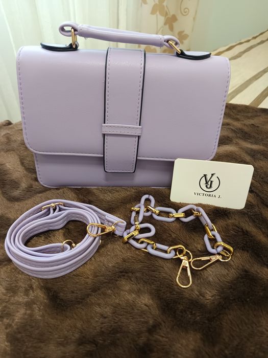 Mala de mão e a tiracolo e porta moedas