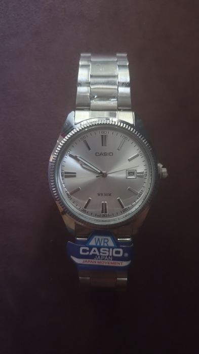 Relógio Casio MTP-1302 - cinza e branco