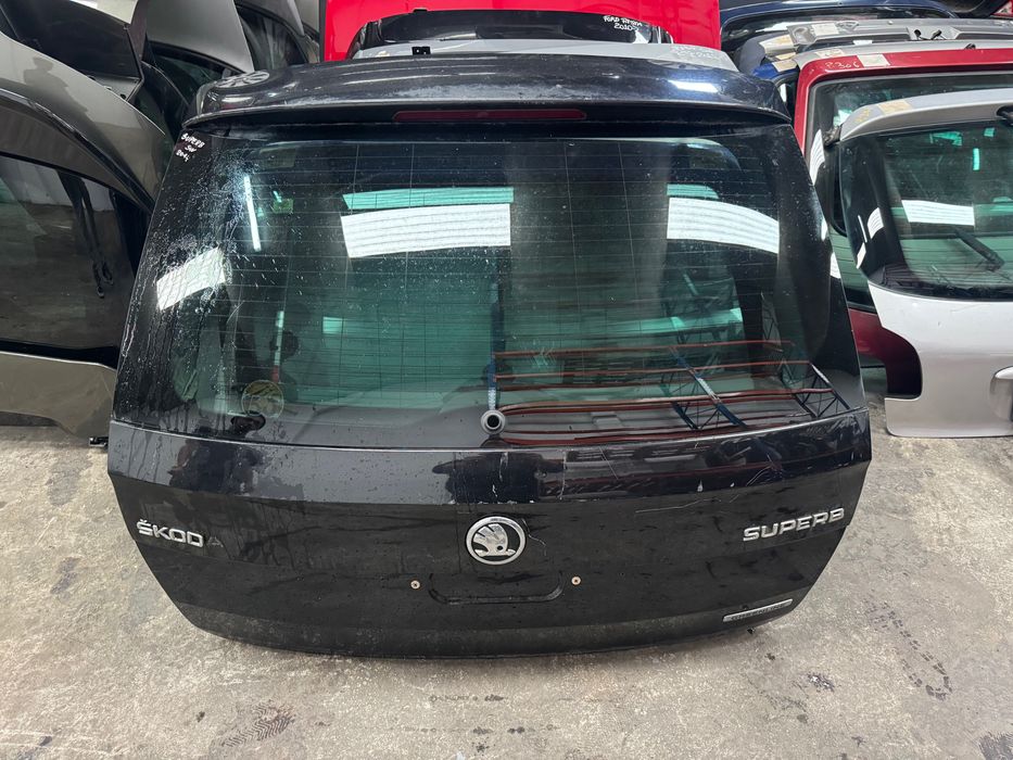 TAMPA DA MALA SKODA SUPERB