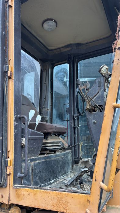 Niveladora Champion 720A