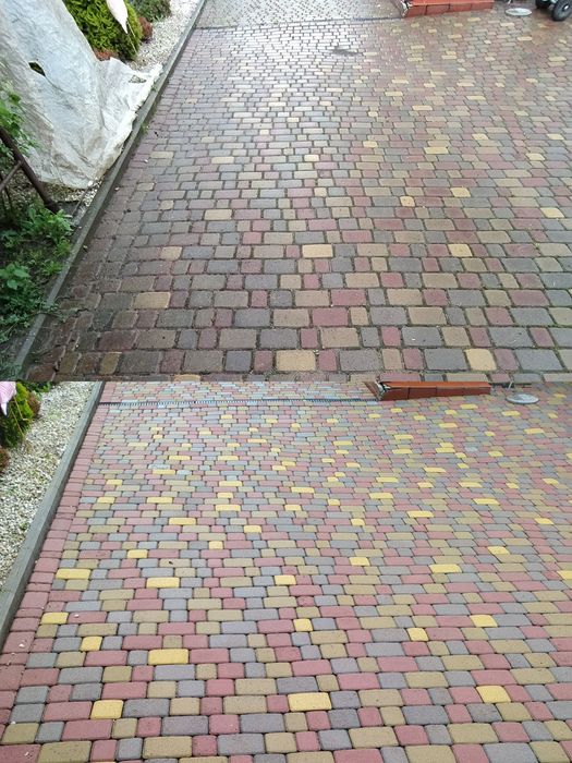 Миття бруківки фасаду парканів