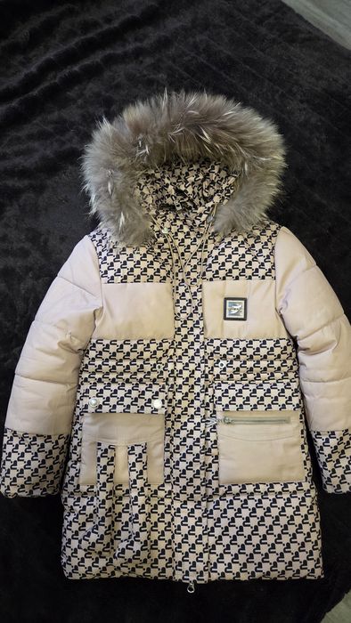 Зимова куртка на дівчинку