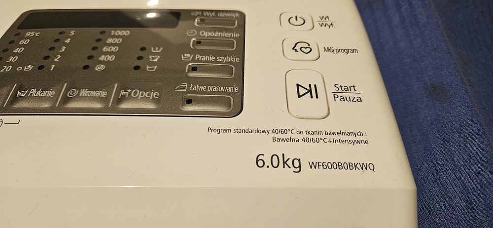 Części pralki Samsung WF600B0BKWQ szuflada i panel sterujacy.