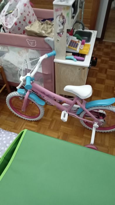 Bicicleta rosa como nova