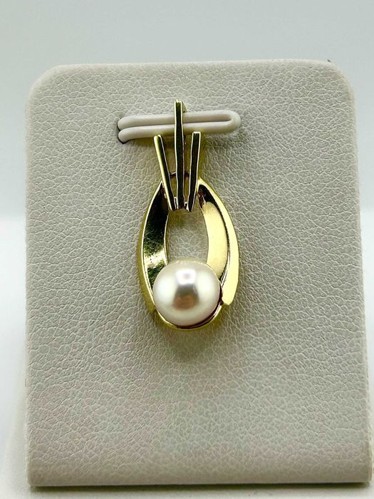 Złota zawieszka z Białą Perłą 1,94 g PR.585 14K