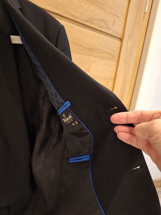 Sprzedam czarny garnitur