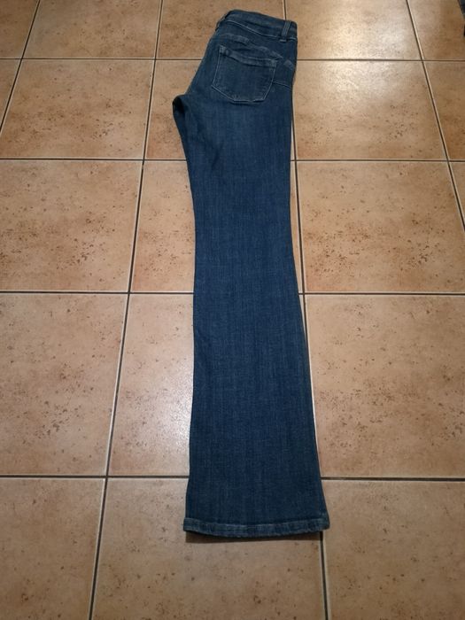Spodnie dzwony dżinsowe, bootcut high rise. Rozmiar M. Push up.
