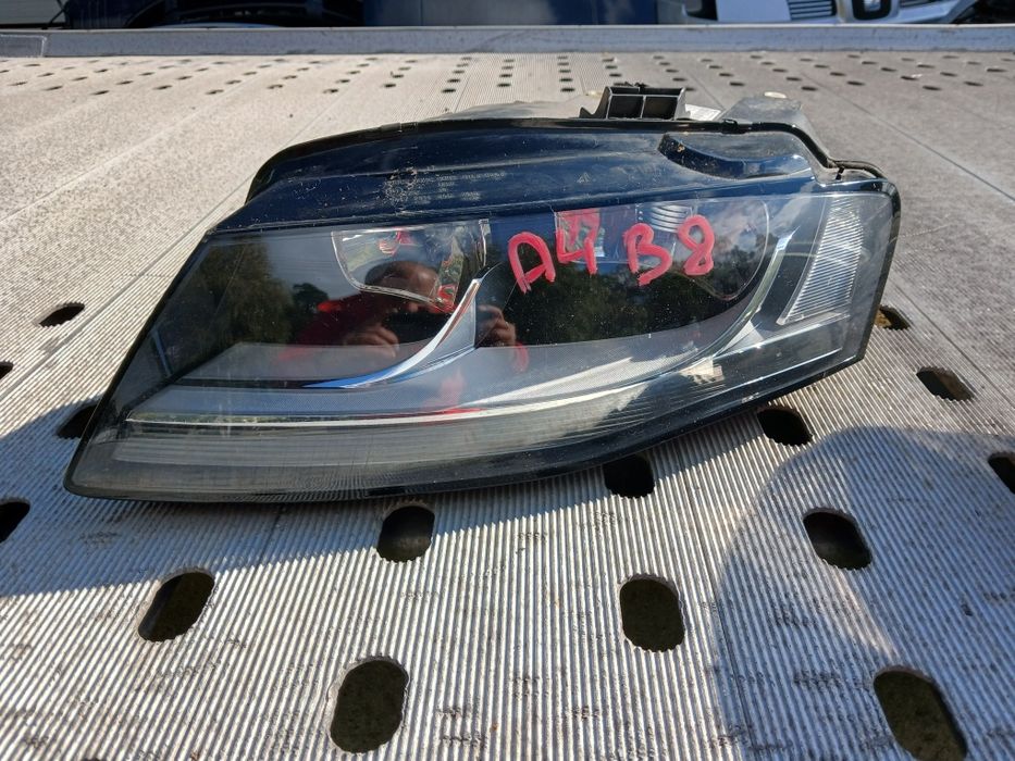 Lampa przednia przód lewa Audi A4B8. Oryginalna. Stan BDB! Druga lewa TYC.