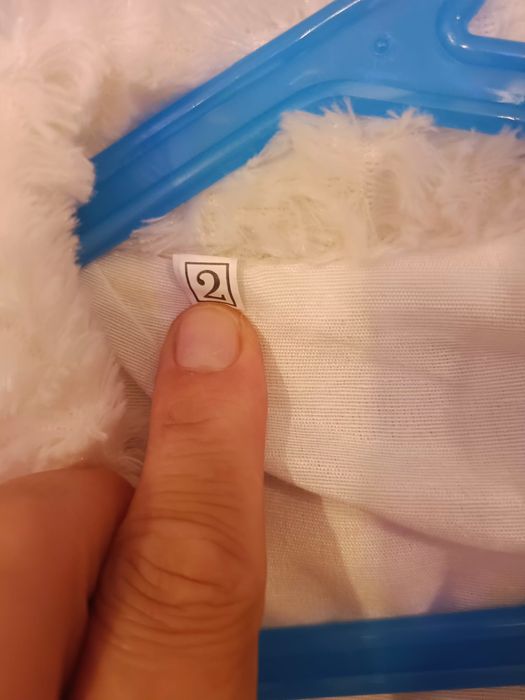 Białe bolerko narzutka 86/92