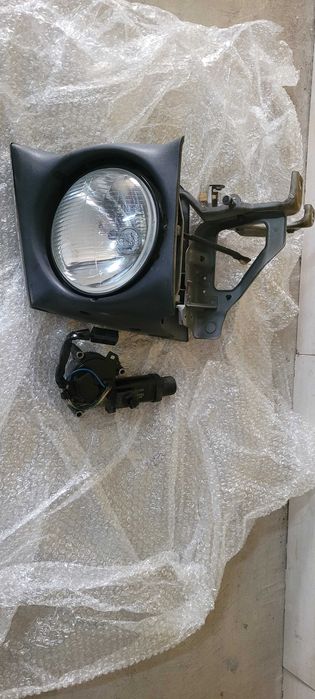 Farol lado Direito com motor MX5 Na