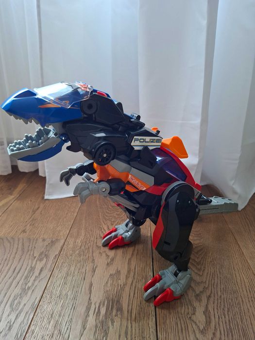 Dinozaur Transformer VTech Switch & Go Mega T-Rex 3w1 Niemiecki