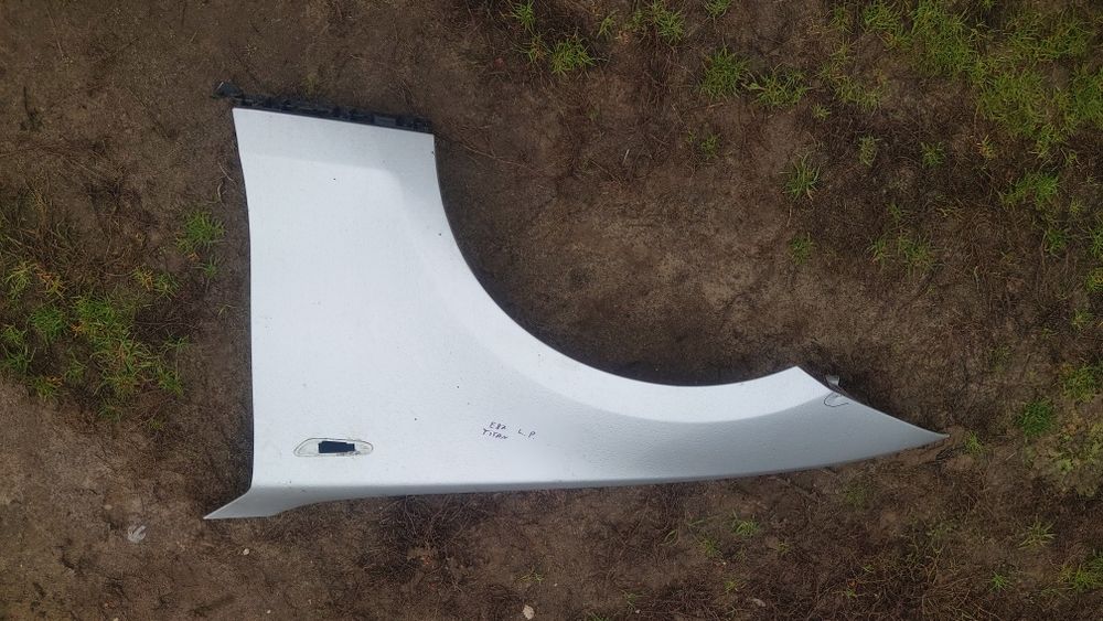 BMW e87 e81 błotnik lewy przód titansilber