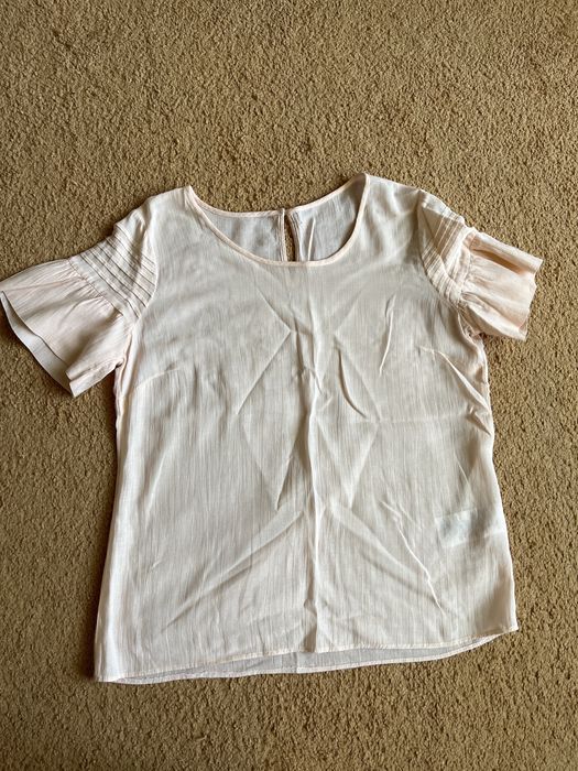 Віддам жіночу рожеву блузку