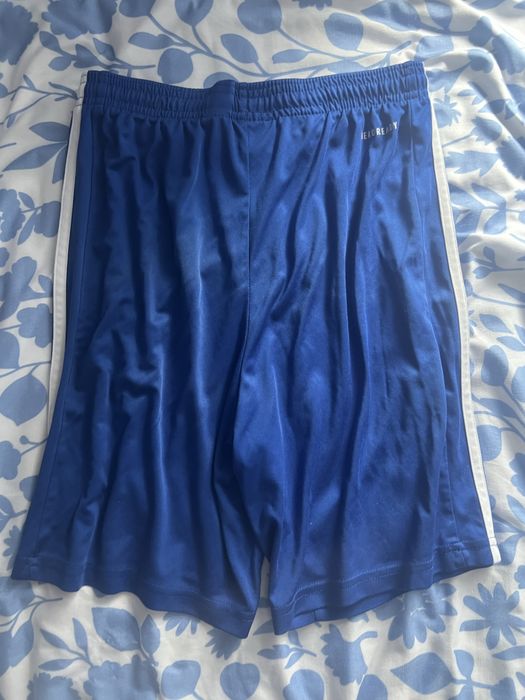 Krotkie spodenki niebieskie Adidas