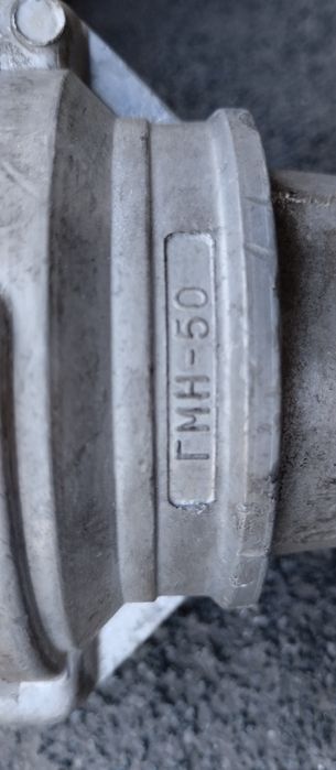 Пожарный рукав с наконечником.