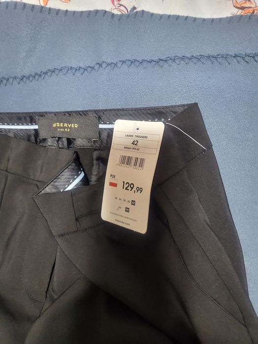 Spodnie RESERVED nowe 42