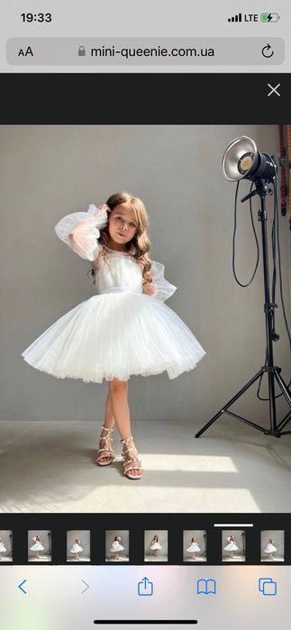 Нарядна біла сукня