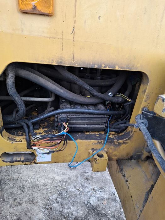 Навантажувач маніту, катерпілер джісібі