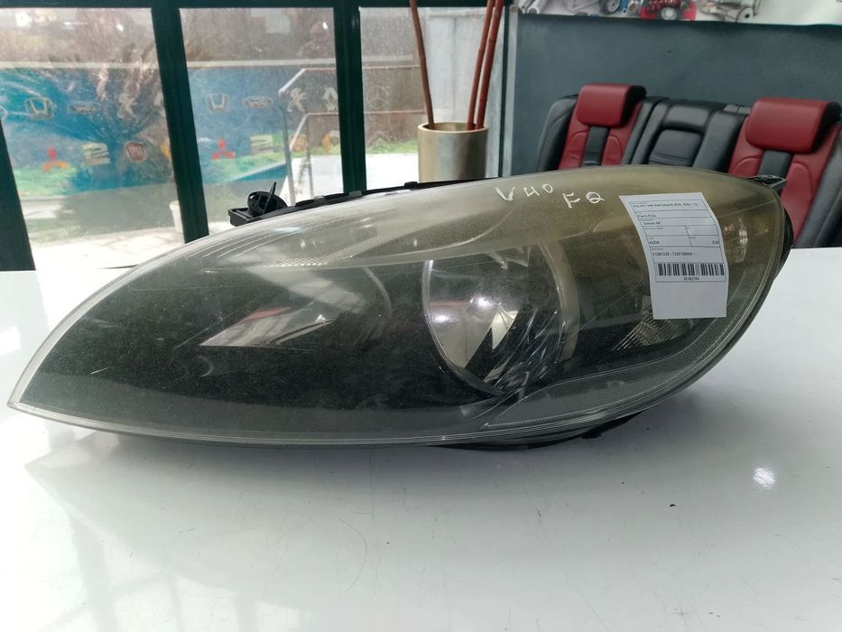 FAROL ESQUERDO VOLVO V40 / 31283326