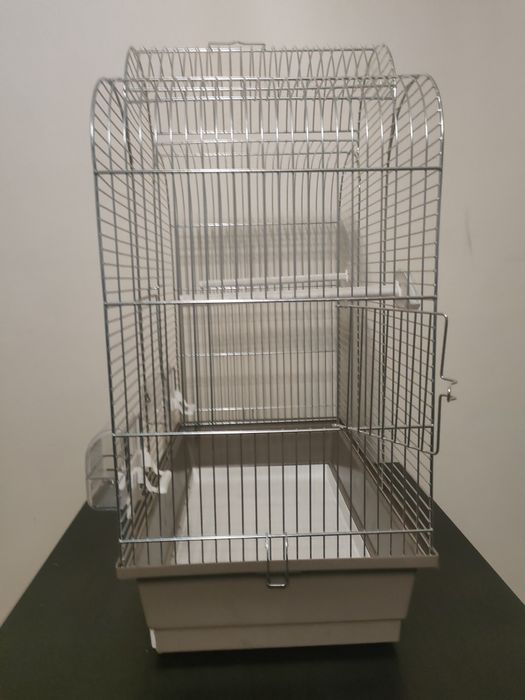Nowa klatka dla małych papug, ptaków.