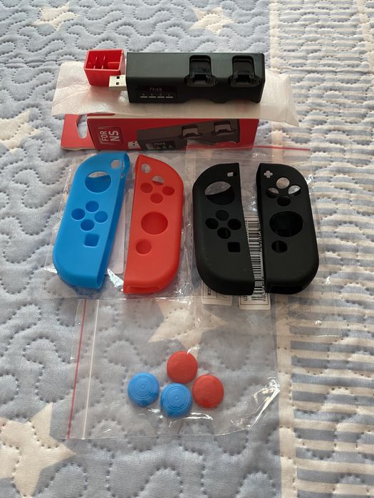 Capas silicone e carregadores joy con switch novas