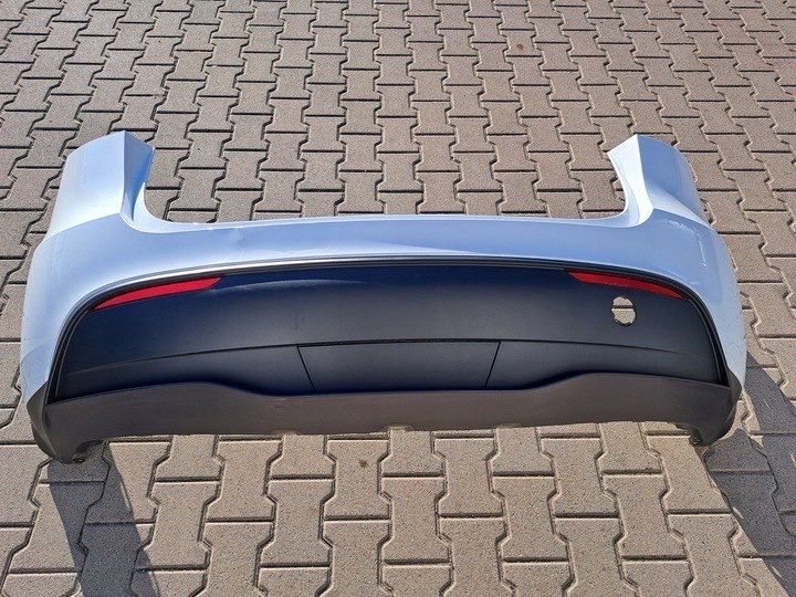 Tesla Model Y бампер задній - рест/до рест