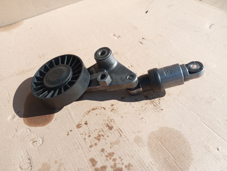 Натяжний ролик механізм 2.0 2.2 Opel Vectra Zafira Astra Omega Fronter