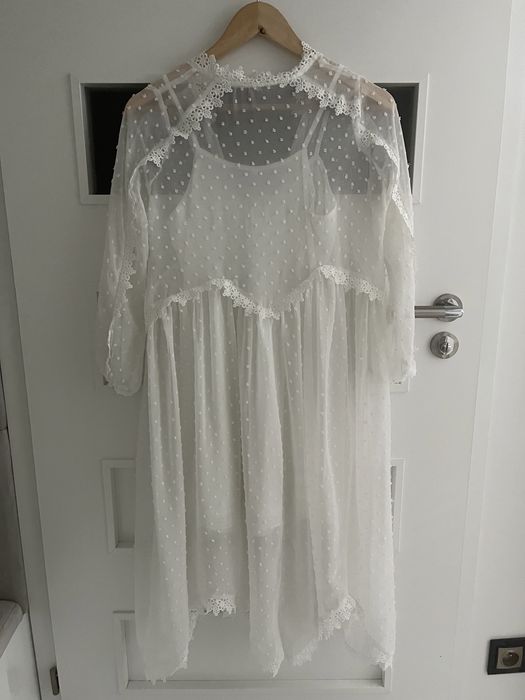 Biala sukienka w stylu boho .