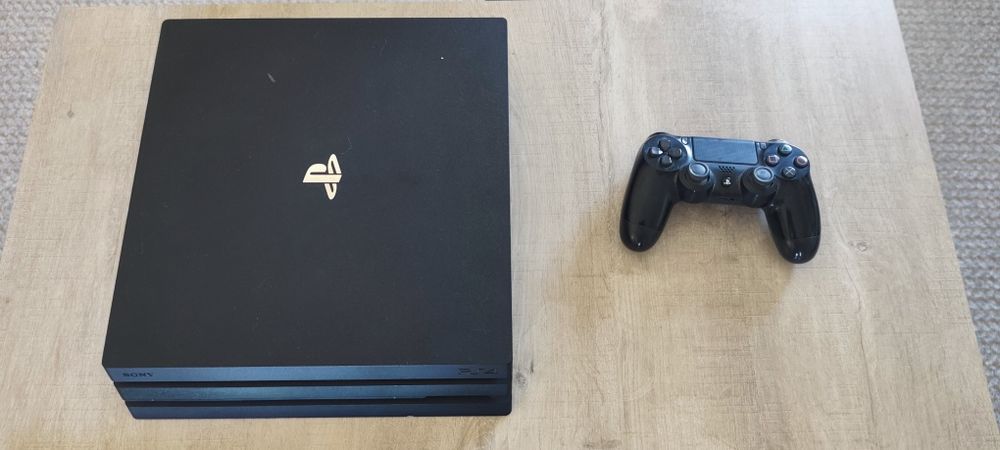Ps4 pro + comando e 12 jogos