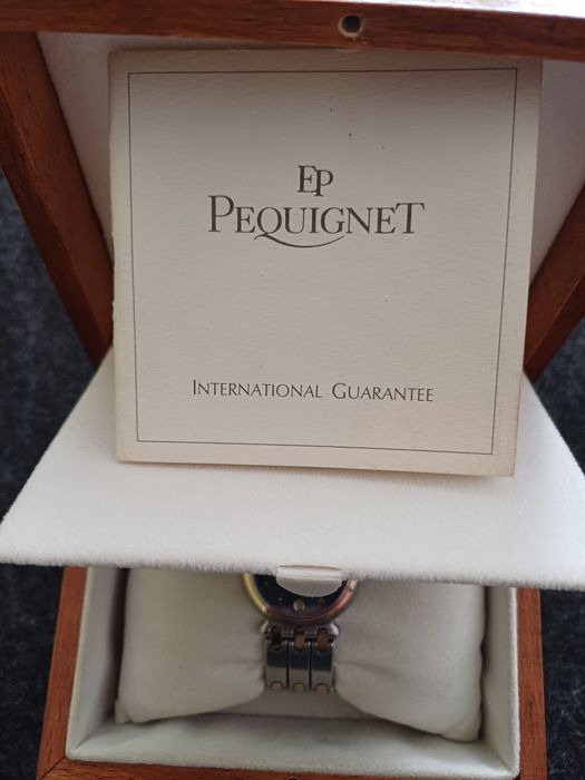 Relógio da marca Emile Pequignet em aço e ouro